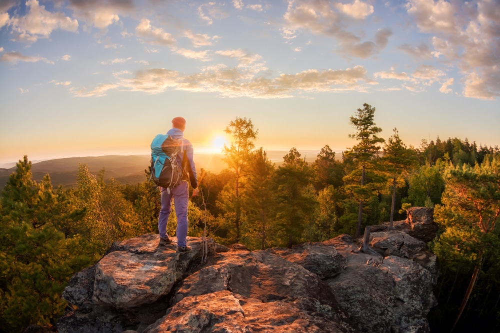 Hiker taking in the view along the Ice Age Trail in Wisconsin