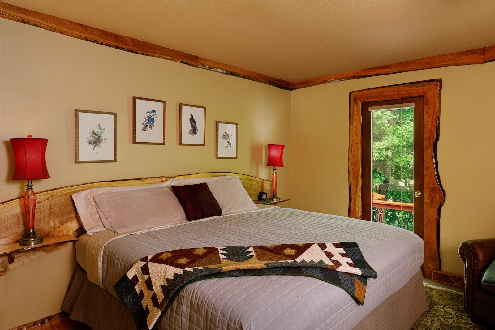 Stay at the best Bed and Breakfast in Wisconsin. This guest room features a king sized bed and window overlooking the forest. 